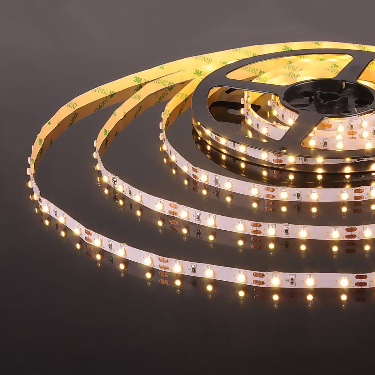 фото светодиодная лента elektrostandard 4,8w/m 60led/m 2835smd теплый белый 5m a052953 | 220svet.ru
