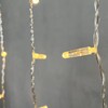 Миниатюра фото гирлянда бахрома с колпачком 3,2 x 0,9 м тепло-белая 220в, 168 led, провод прозрачный пвх, ip65 ltc pil180cap-10-2ww | 220svet.ru